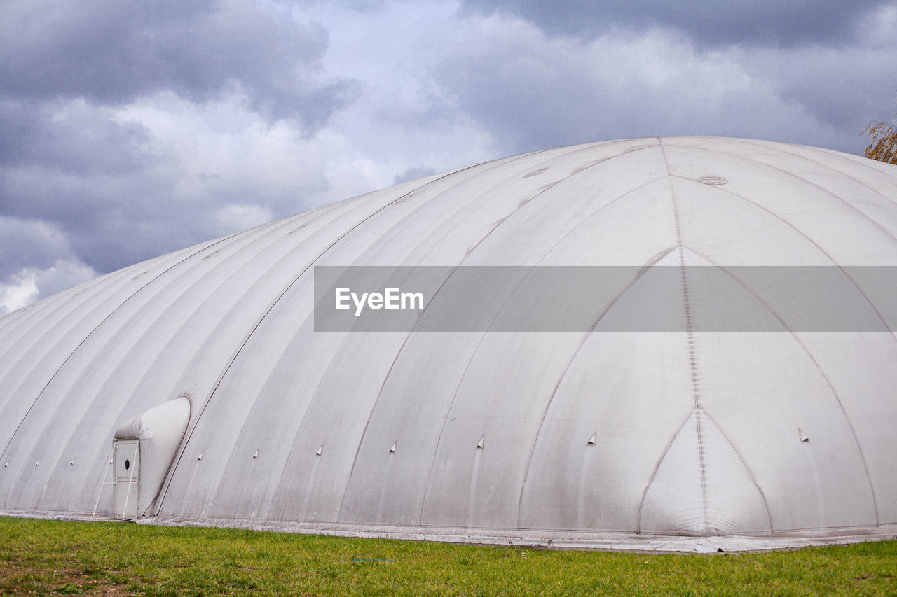 White inflatable hangar. canopy made of tarpaulin. prefabricated sports facilities.
