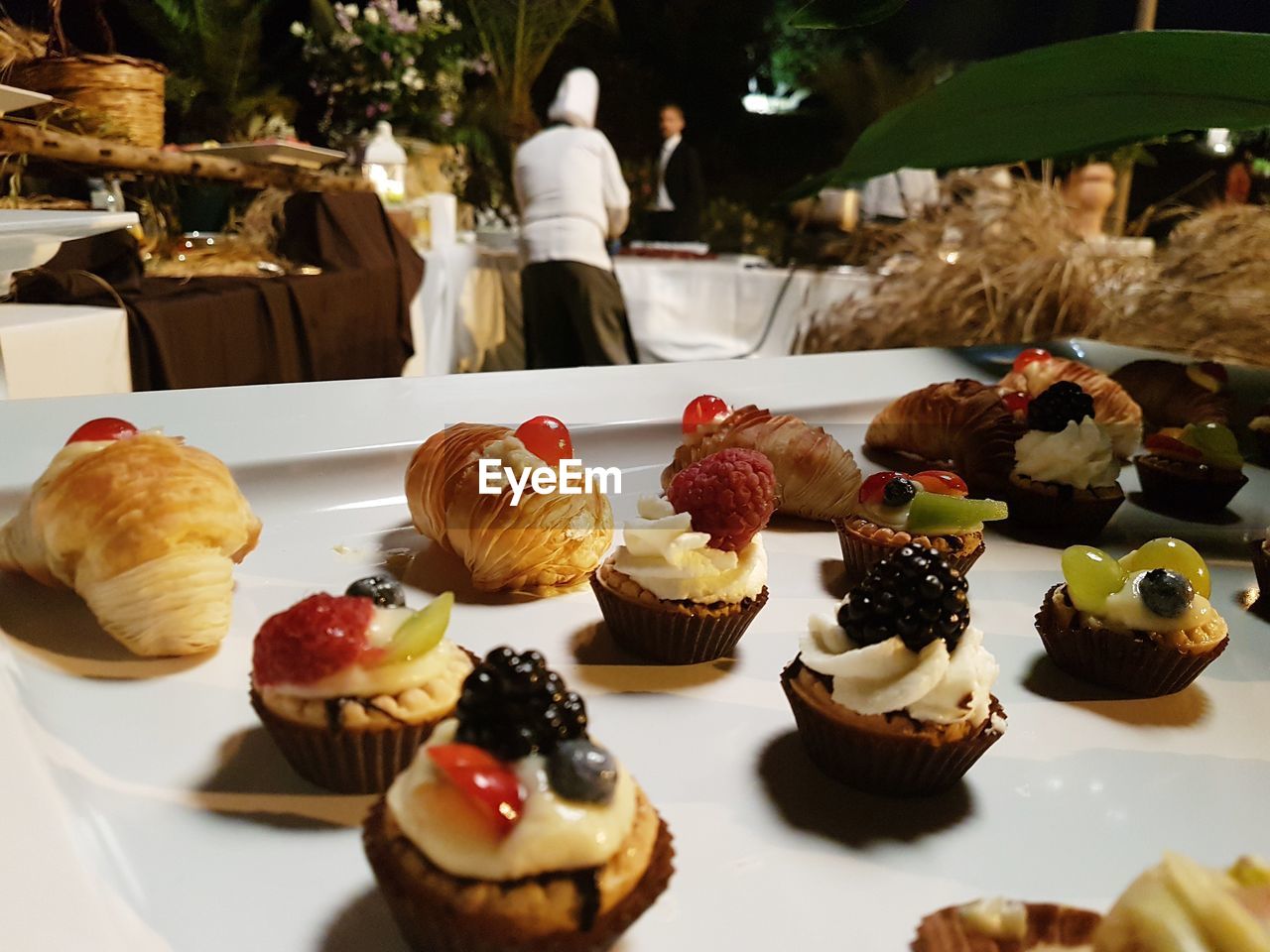 FULL FRAME SHOT OF CAKE WITH FRUITS ON TABLE