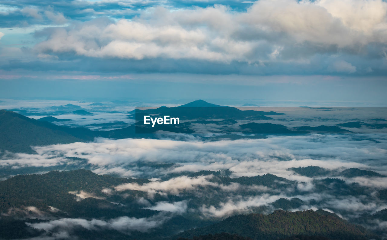 Aerial view of cloudscape over mountains