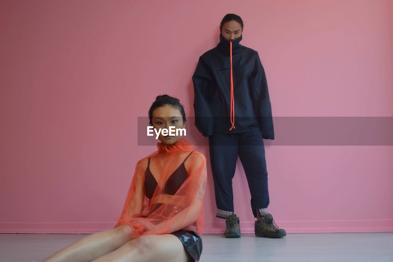 Portrait Of People Posing Against Pink Id 123169904 Being able to instruct your subjects in how to sit or. eyeem