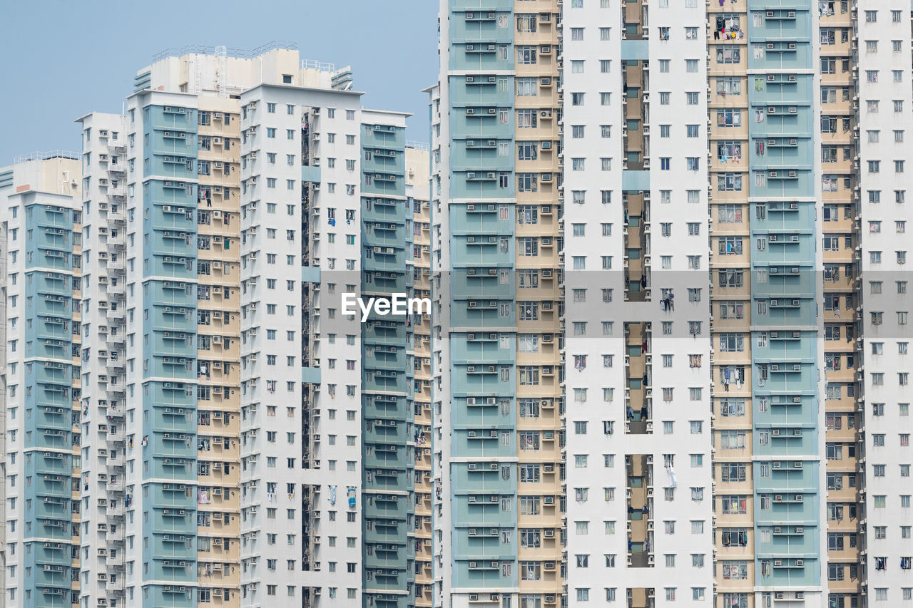 Full frame shot of residential buildings against sky