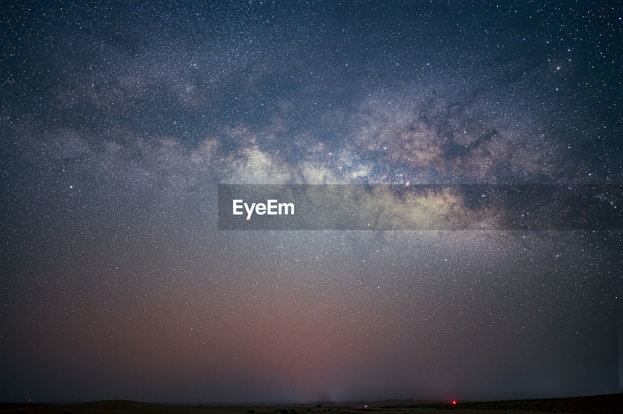 SCENIC VIEW OF STAR FIELD AGAINST SKY