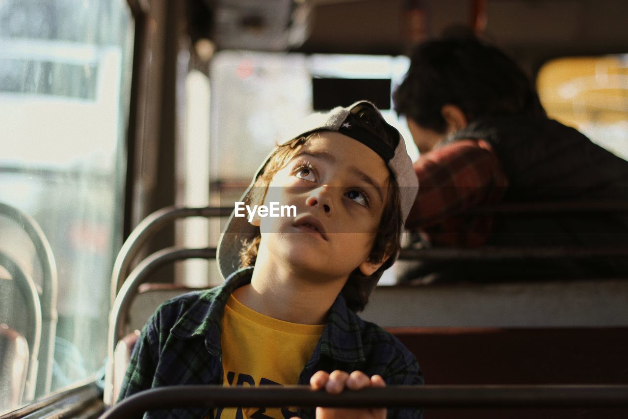 Boy sitting in bus