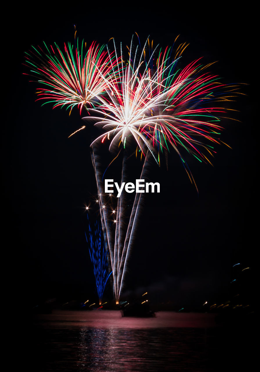 Firework display at night