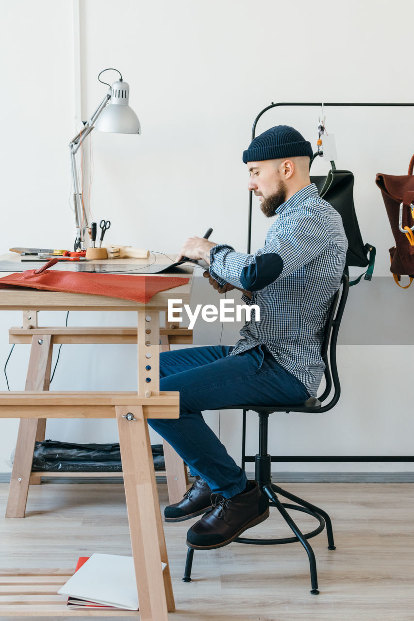 Creative man working at desk