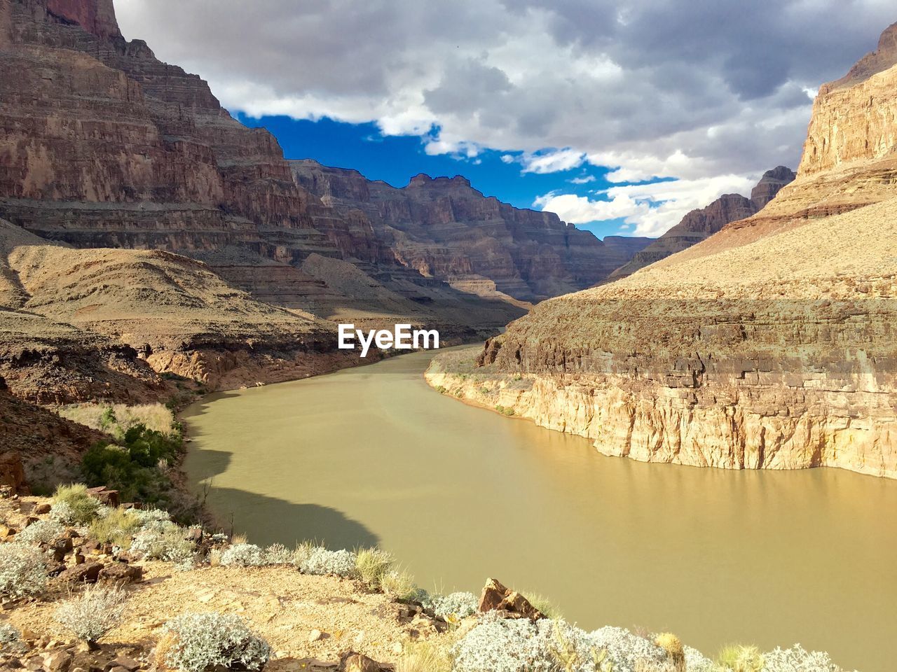 Scenic view of grand canyon against cloudy sky