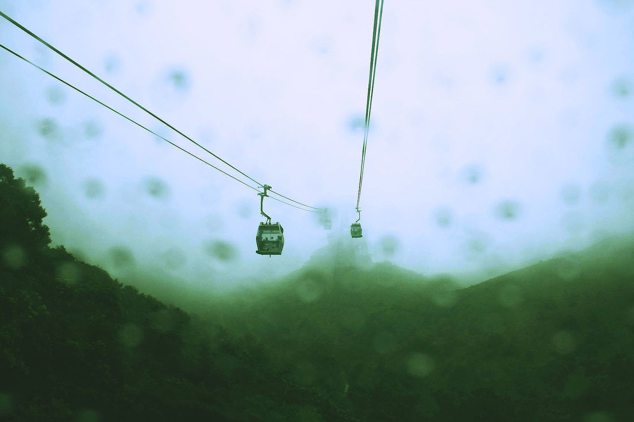 Overhead cable car at rainy day