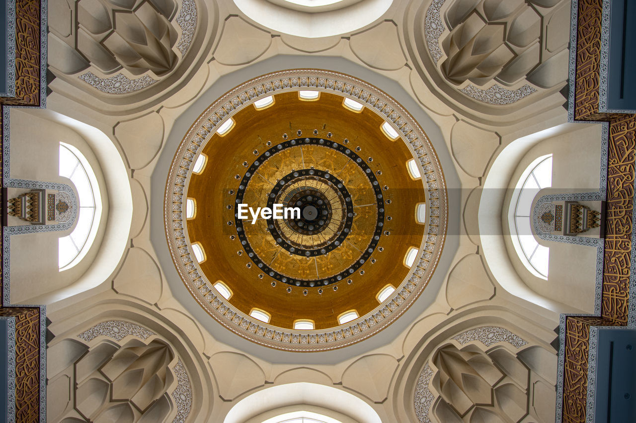 architecture, built structure, ceiling, no people, ornate, pattern, circle, shape, dome, directly below, indoors, geometric shape, low angle view, building, art, religion, architectural feature, place of worship, belief, craft, travel destinations, ancient history, spirituality, history, the past, decoration, cupola, architecture and art, day, column