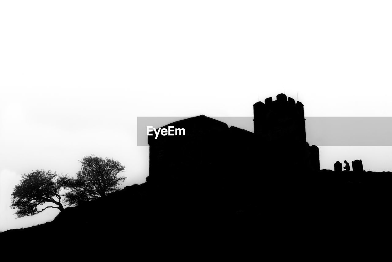 SILHOUETTE OF FORT AGAINST CLEAR SKY