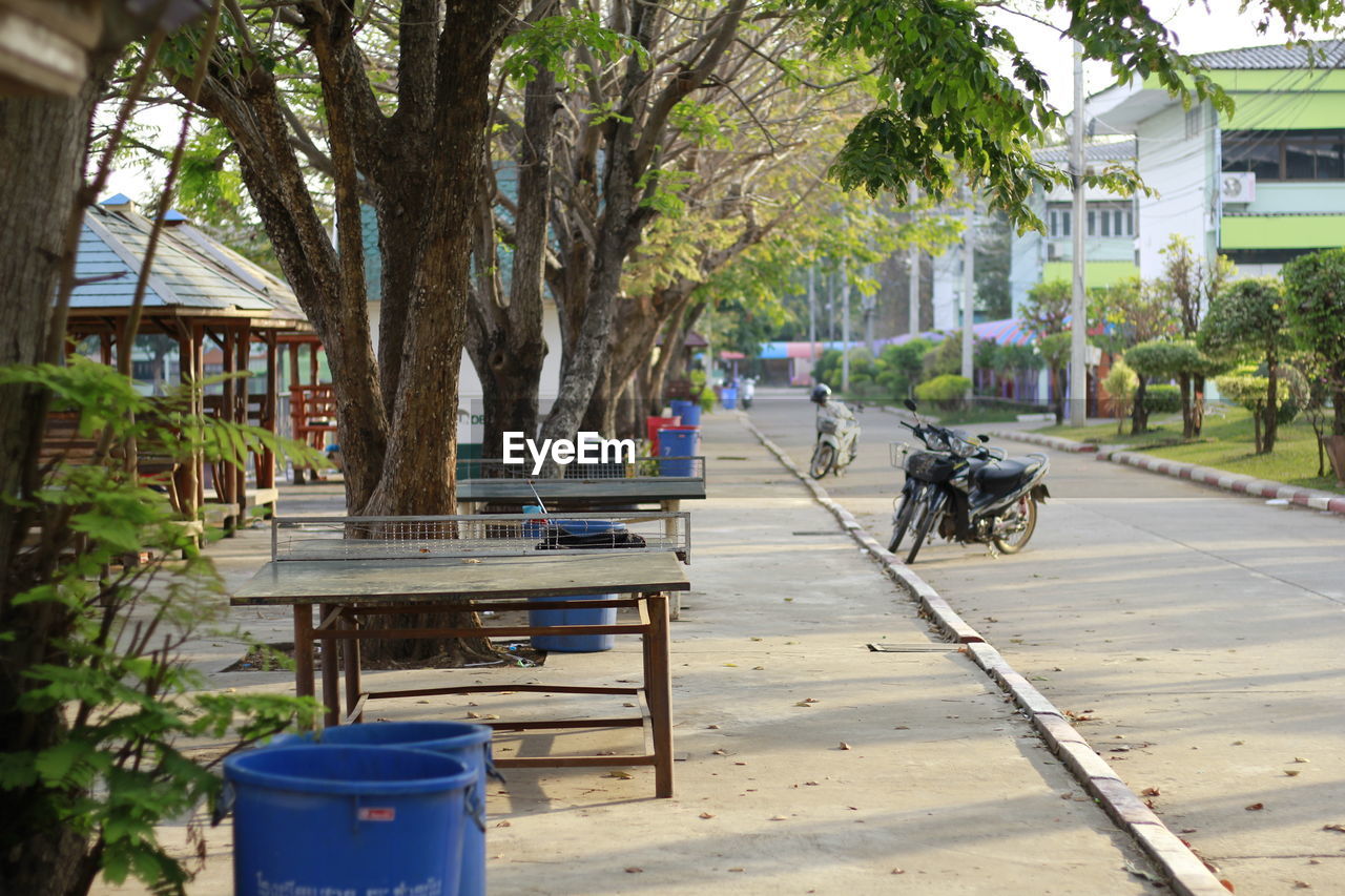 Footpath by street in city