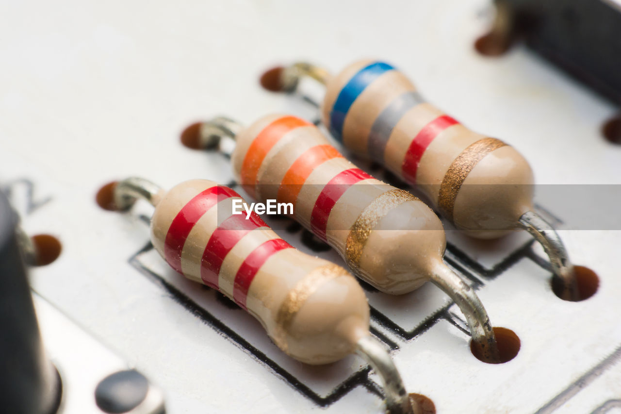 High angle view of capacitors white circuit board