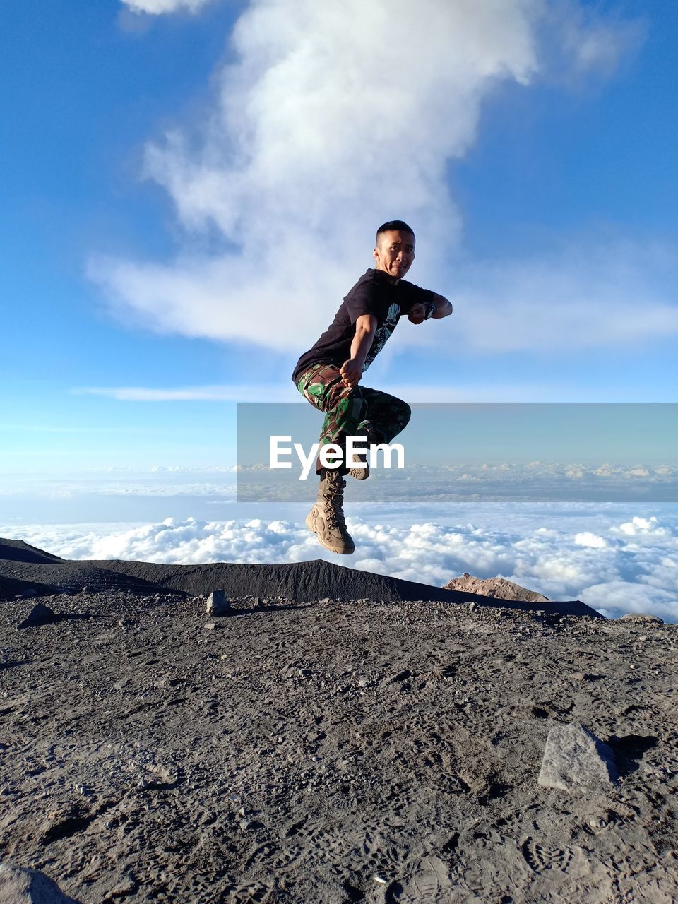 Performs silat kicks in the air