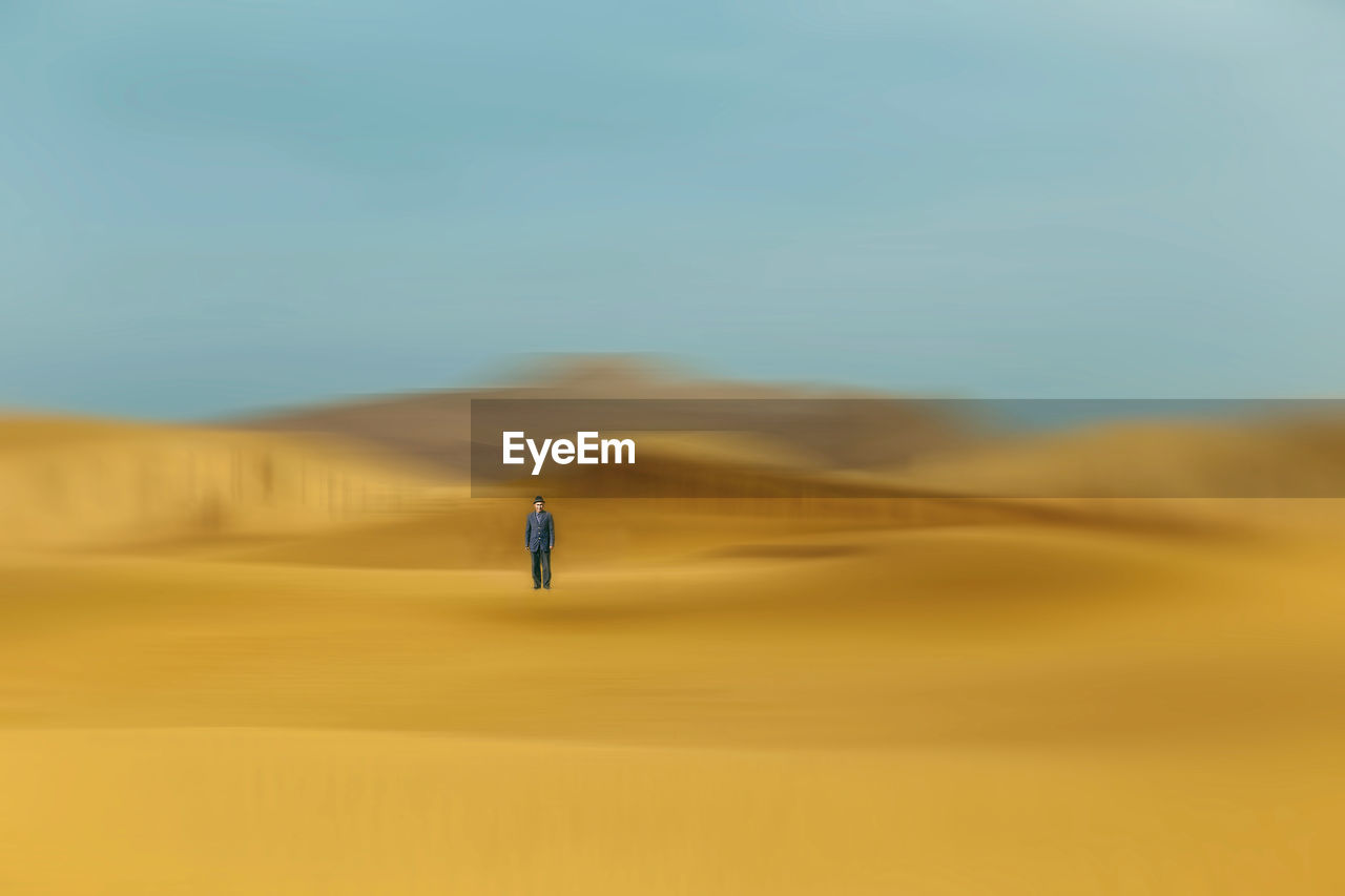 Man standing at desert
