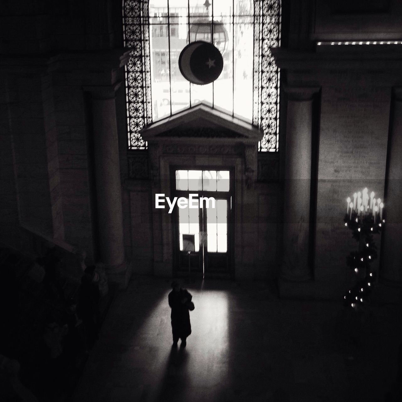 High angle view of a silhouette person in the lobby