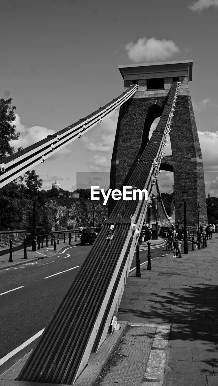 Low angle view of bridge against sky in city