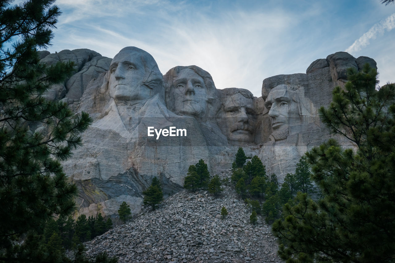 Low angle view of mount rushmore national memorial against sky