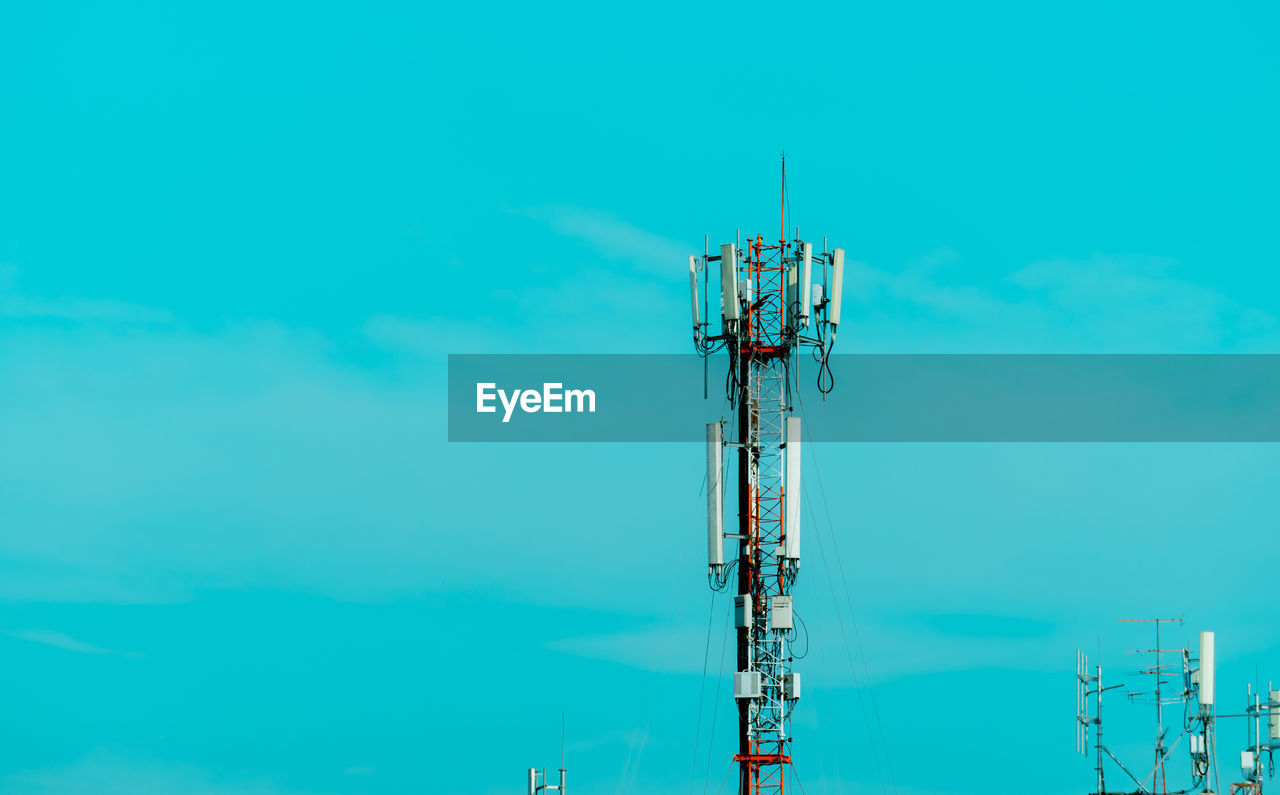 Telecommunication tower with blue sky background. radio and satellite pole. communication.