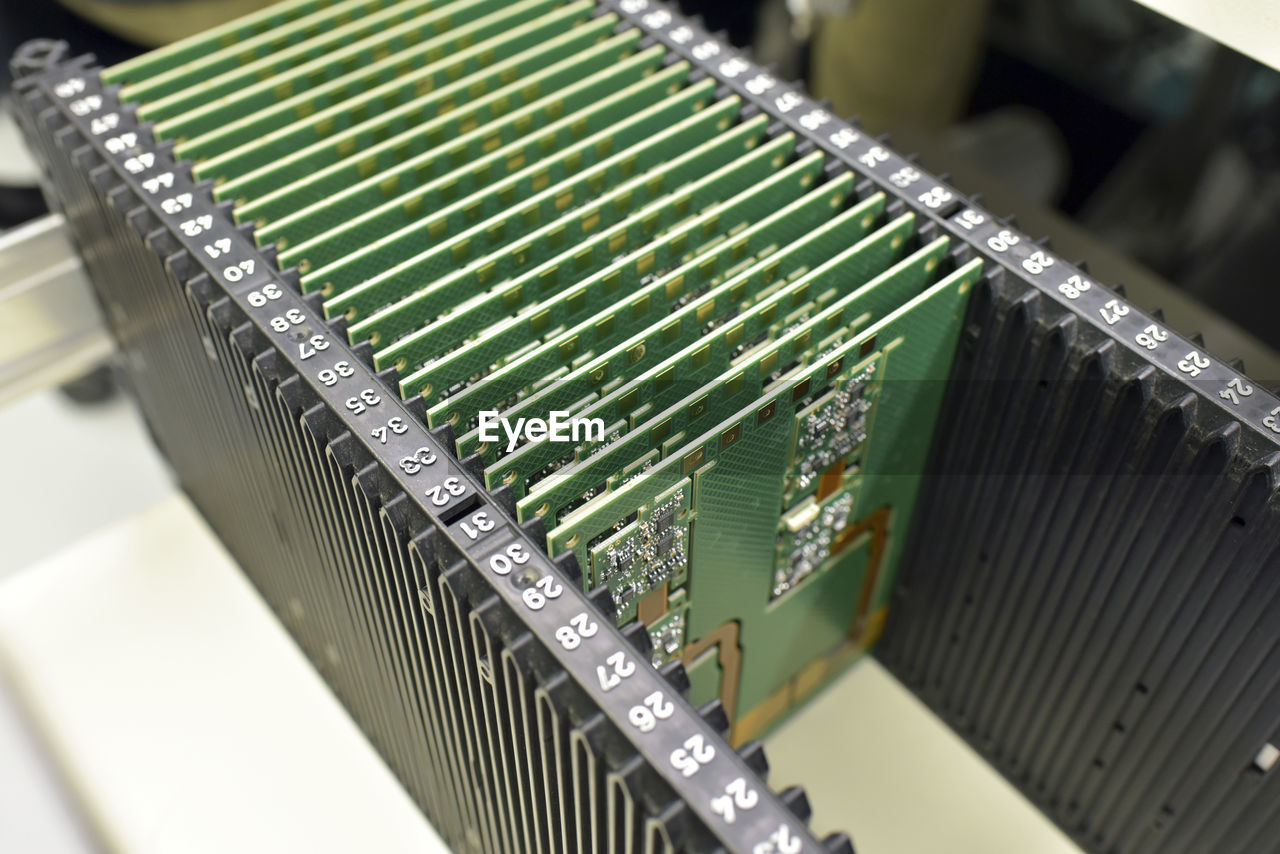 Close-up of circuit boards in an electronics factory