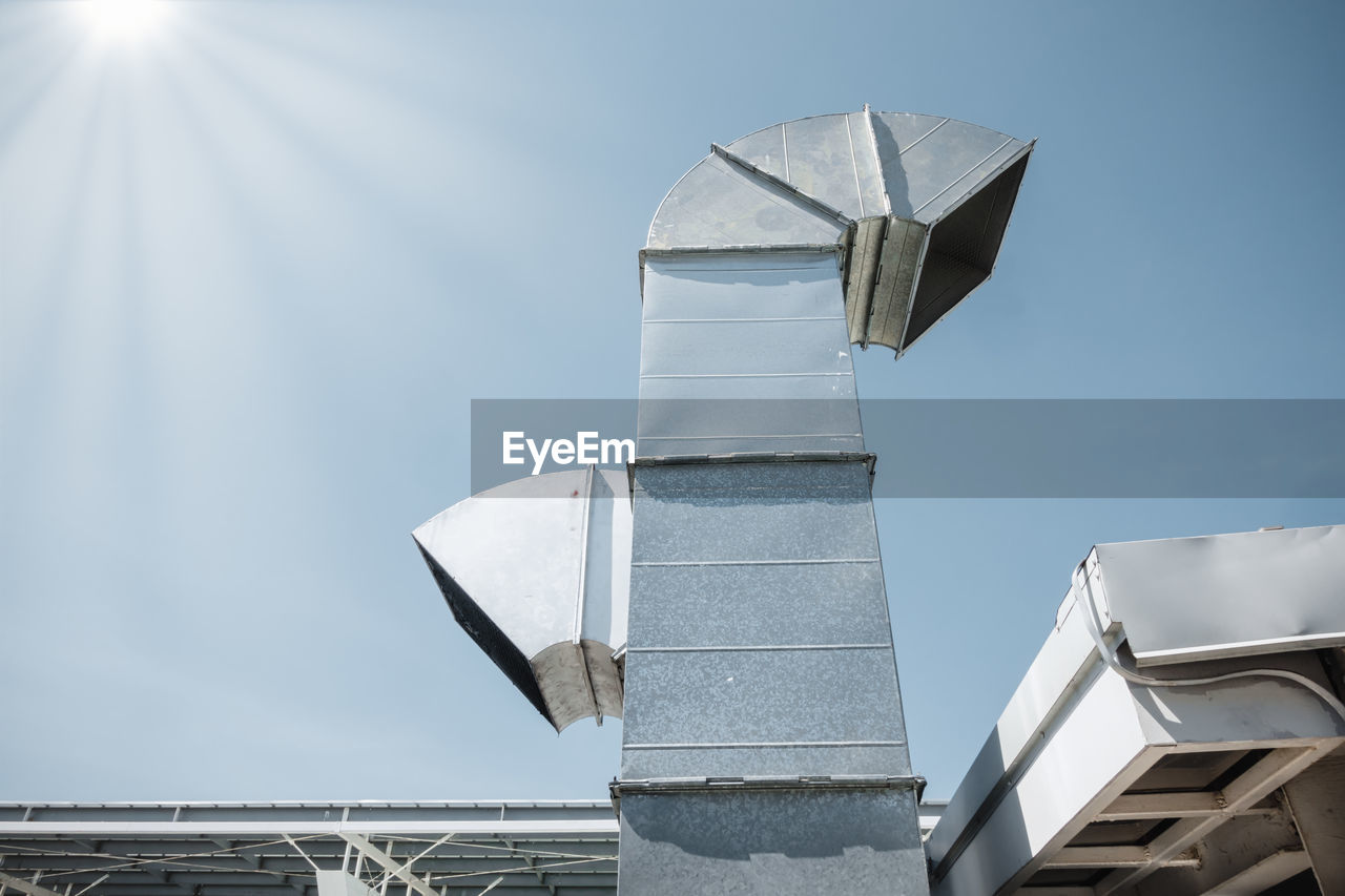 LOW ANGLE VIEW OF WIND TURBINE AGAINST SKY