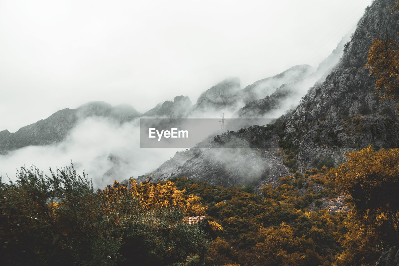 Scenic view of mountains against sky during autumn
