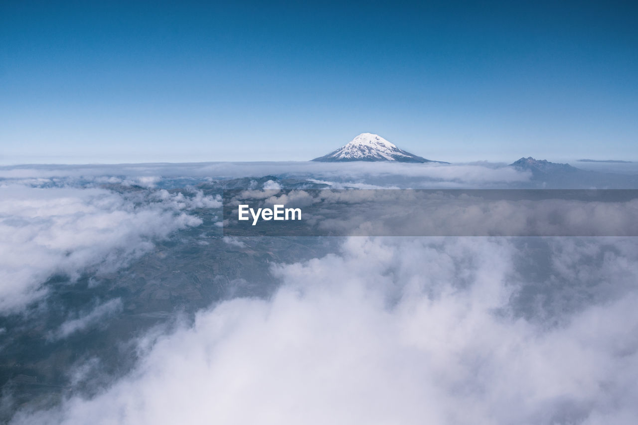 Scenic view of snowcapped mountain against sky