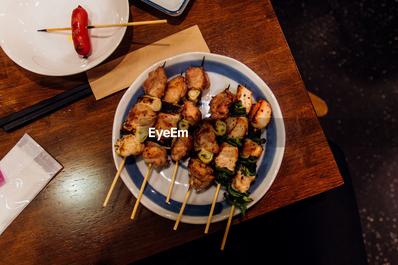 Directly above shot of yakitori in plate on table