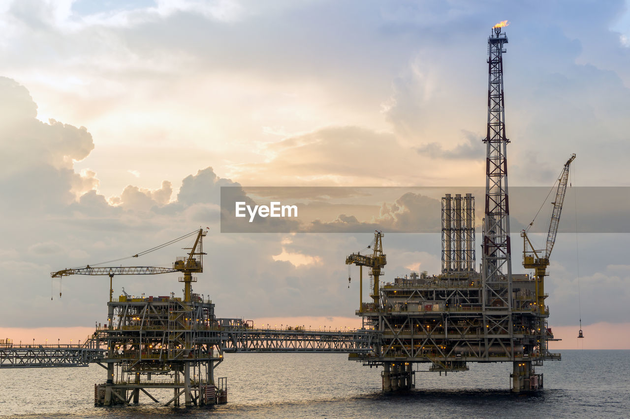 Seascape of an oil production platform during sunset at offshore terengganu oil field