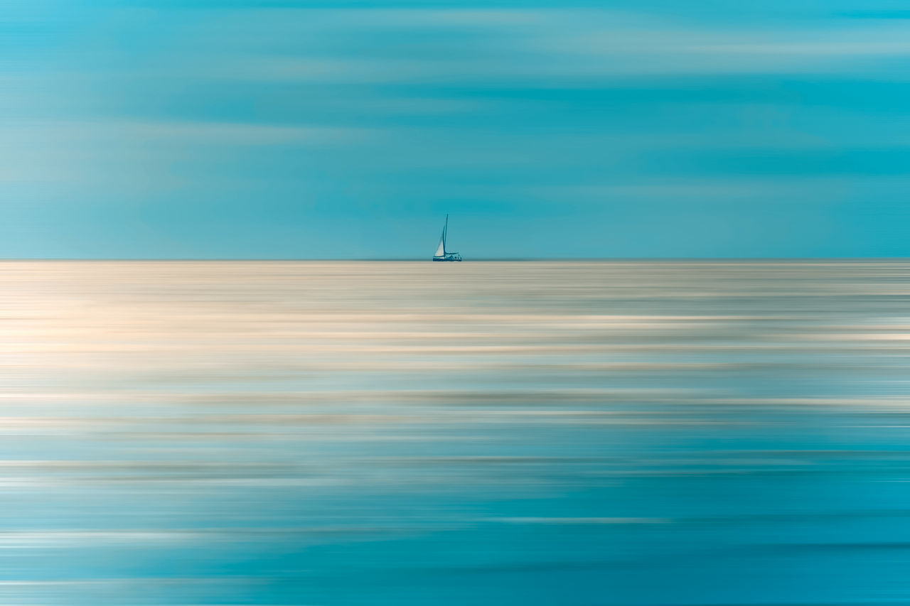 Lonely sailboat on the ocean