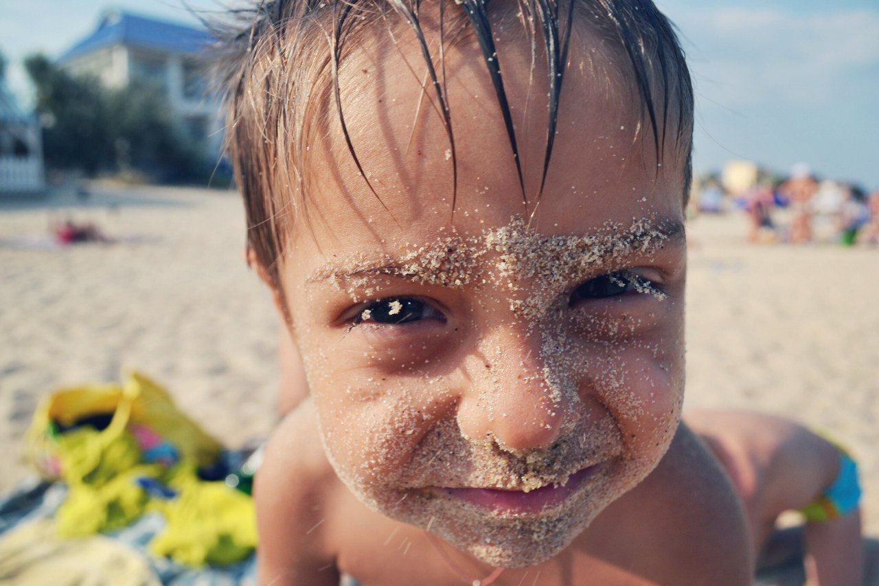 Close-up of funny child on beach