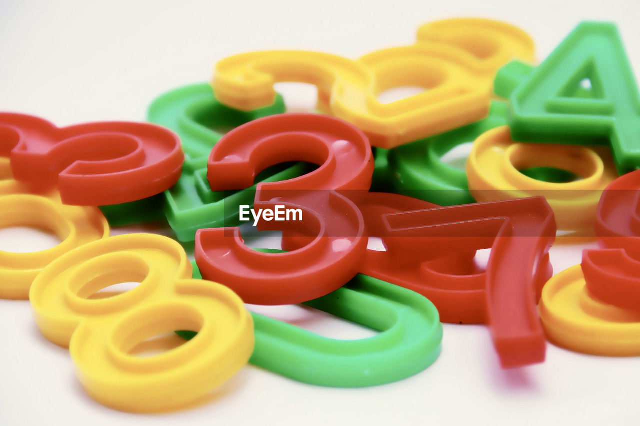 Close-up of colorful numbers on white background