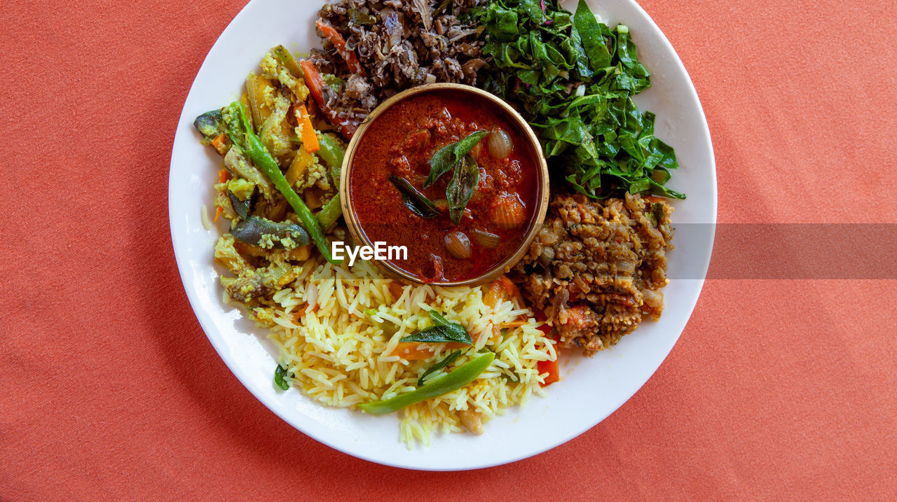 High angle view of indian food served on table
