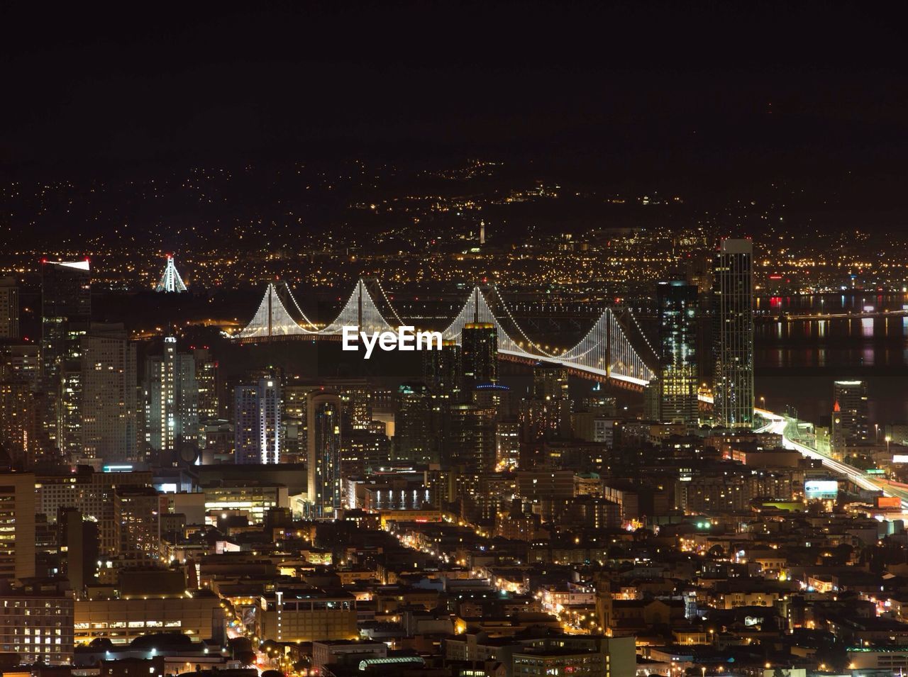 High angle view of illuminated cityscape at night