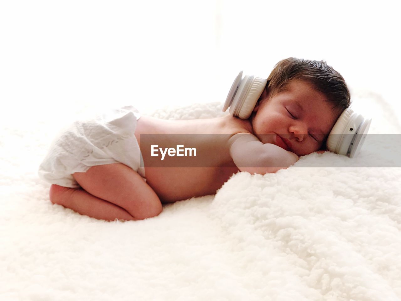 wearing earbuds while sleeping