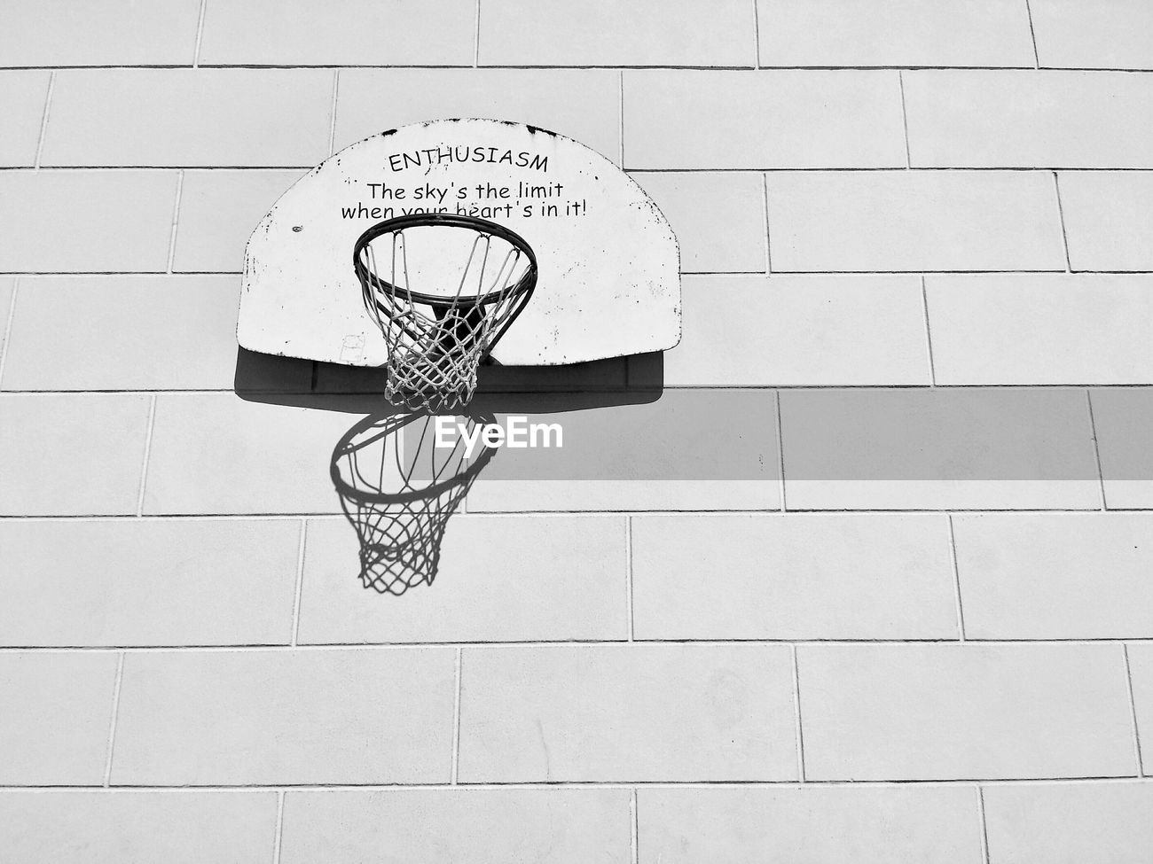 Low Angle View Of Basketball Hoop On Brick Id 62277405