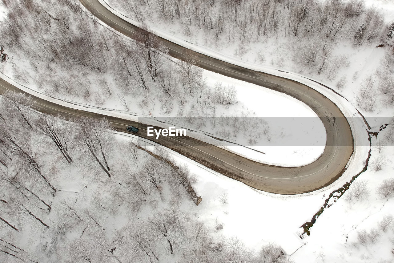 High angle view of winding road during winter