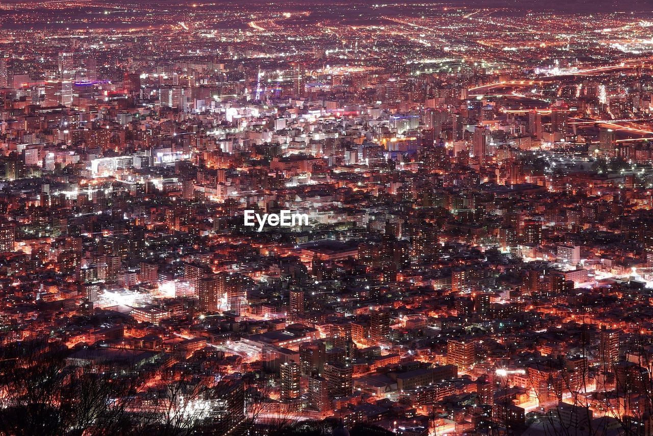 Full frame shot of illuminated cityscape at night