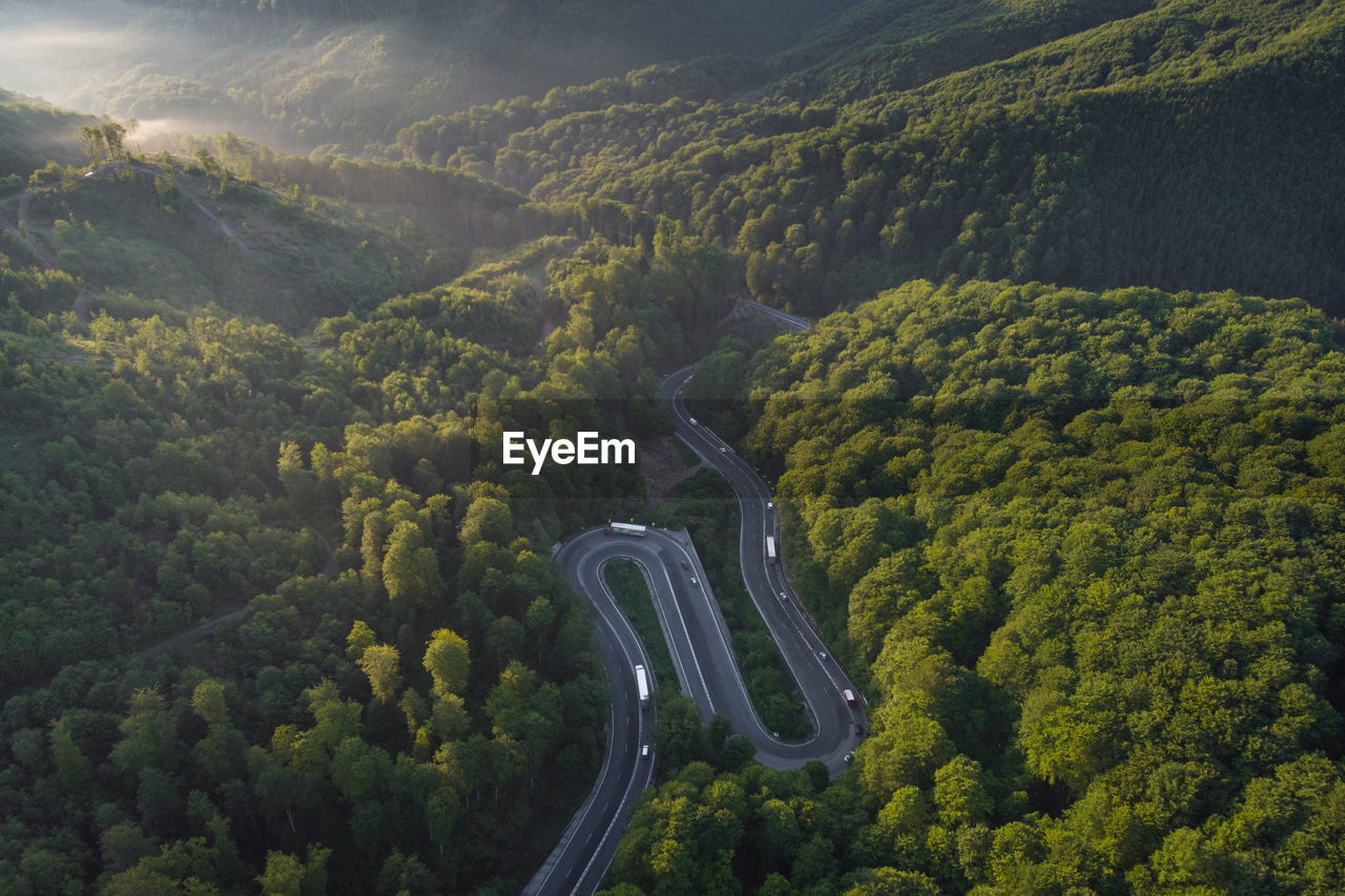Summer aerial view of transalpina mountain road, at sunrise