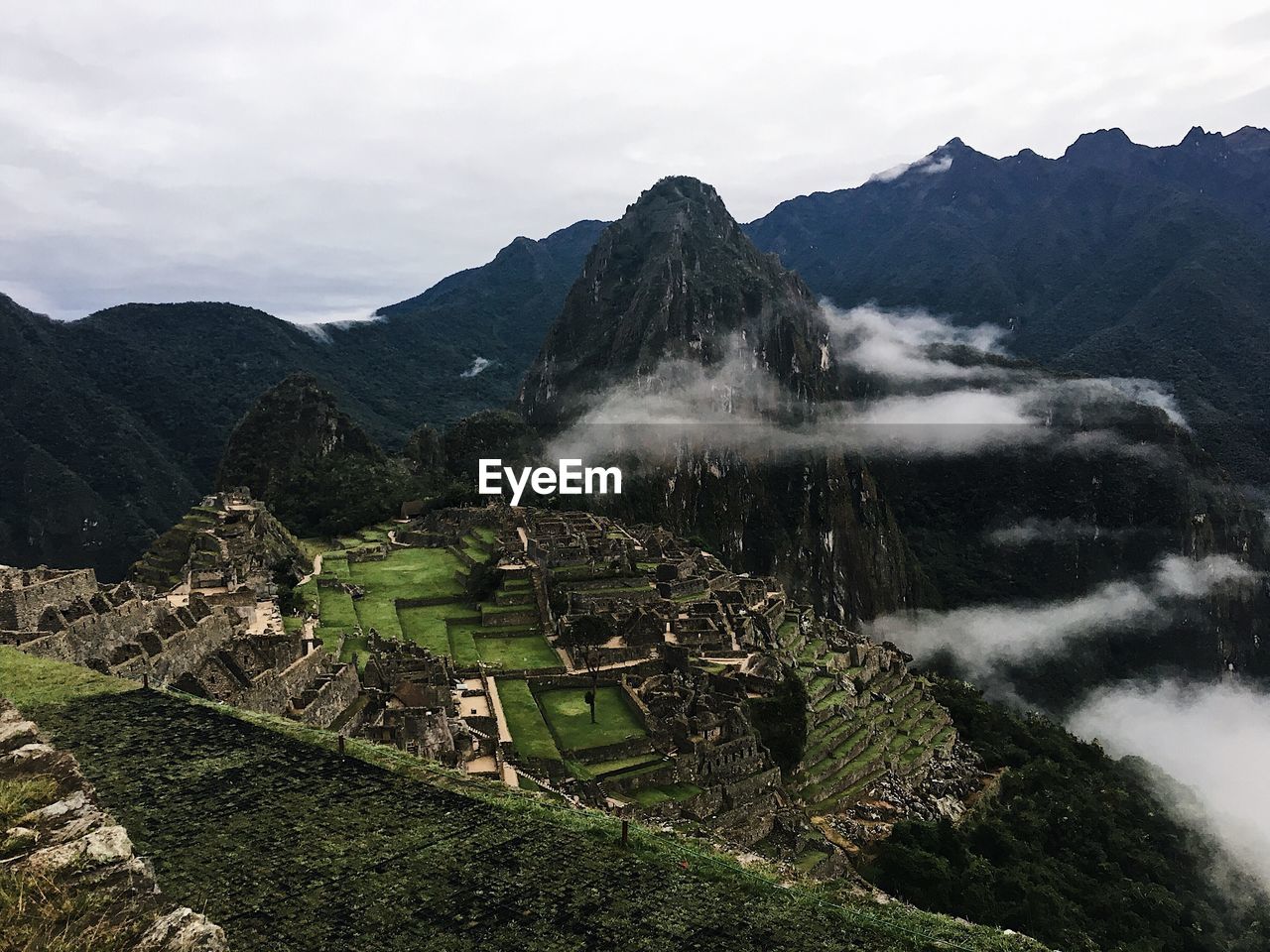 High angle view of old ruins at machu picchu against sky