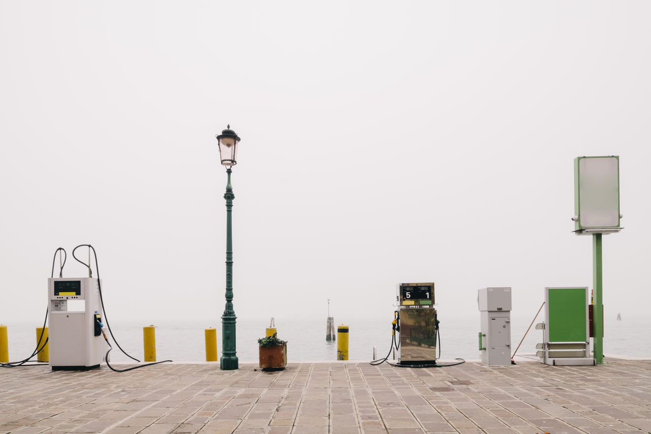 Gasoline on promenade against sky