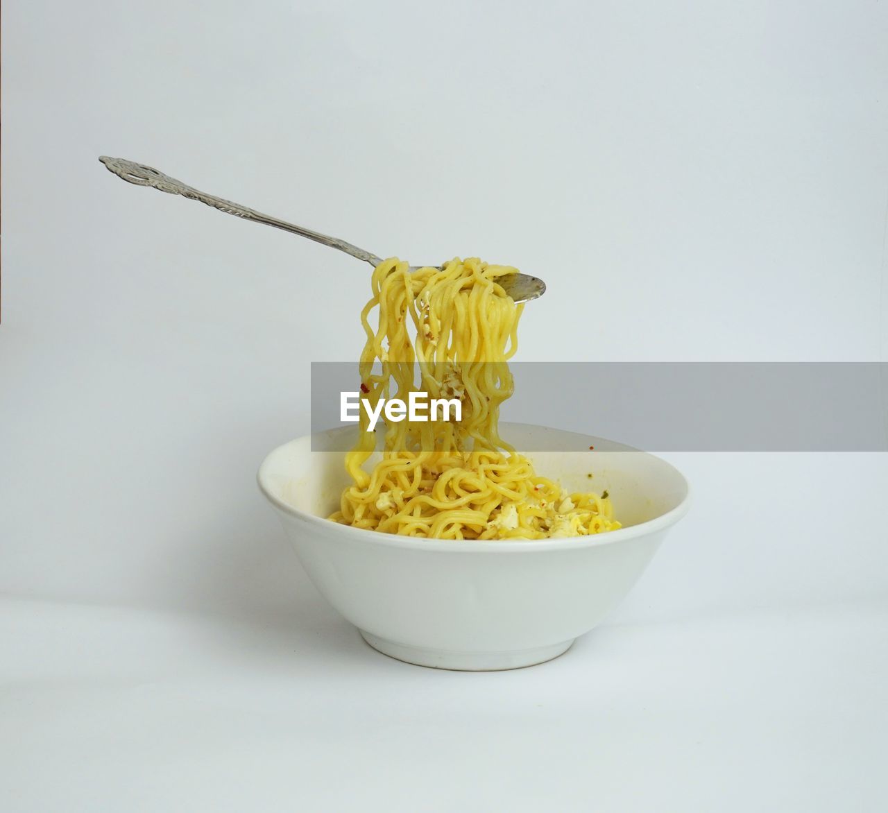 pasta, food, food and drink, italian food, bowl, wellbeing, studio shot, indoors, healthy eating, spaghetti, freshness, kitchen utensil, white background, yellow, no people, eating utensil, spoon, dish, ingredient, still life, cuisine, noodle