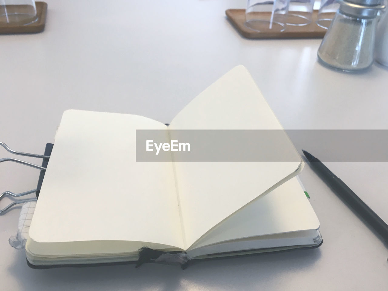HIGH ANGLE VIEW OF OPEN BOOK