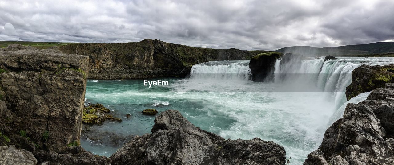 Scenic view of waterfall in iceland