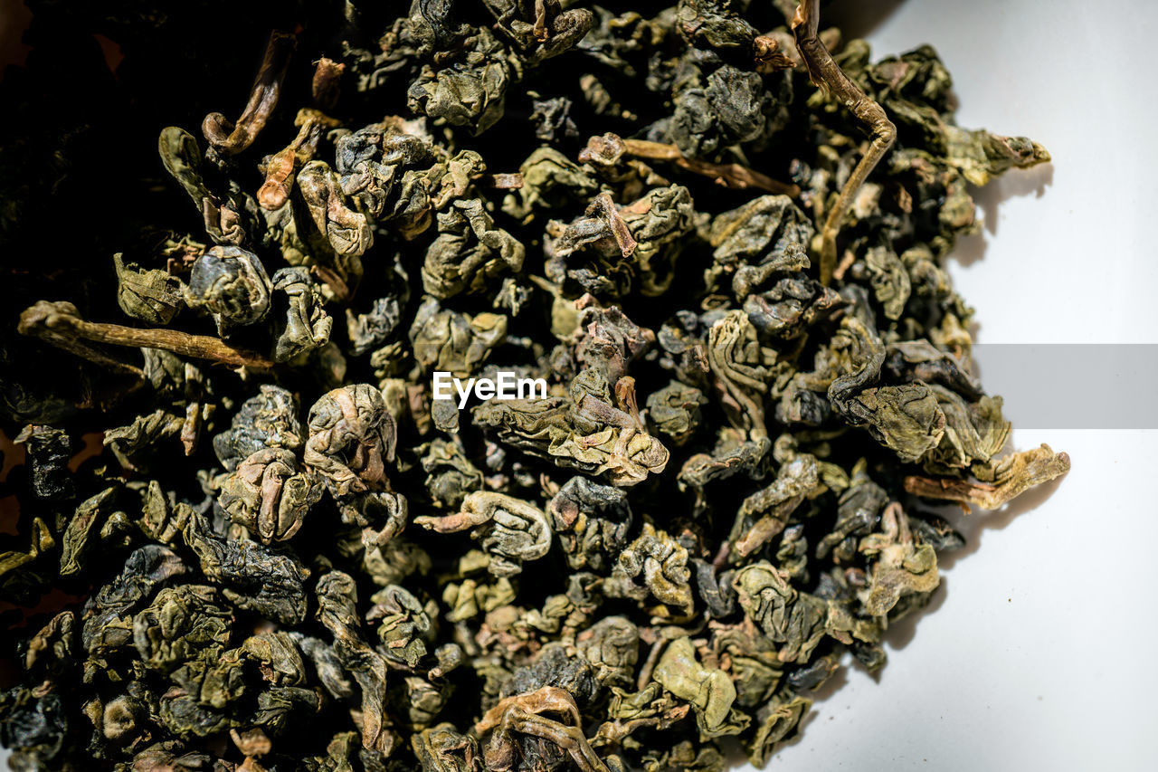 Close-up of marijuana on table