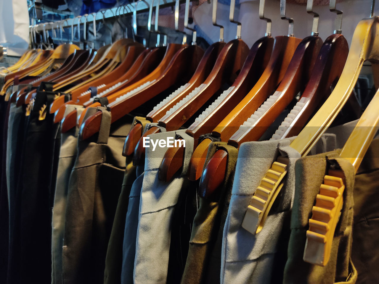 PANORAMIC VIEW OF CLOTHES HANGING ON RACK