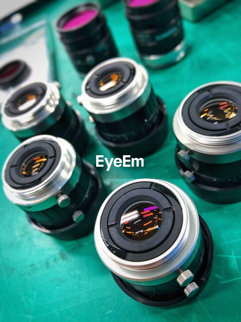 High angle view of camera lens on table