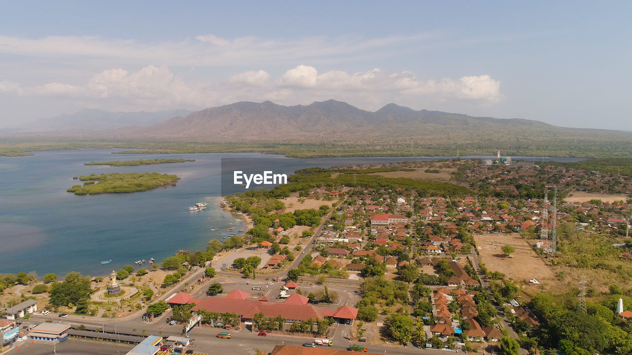 Aerial view ferry port gilimanuk with ferry boats, vehicles. 