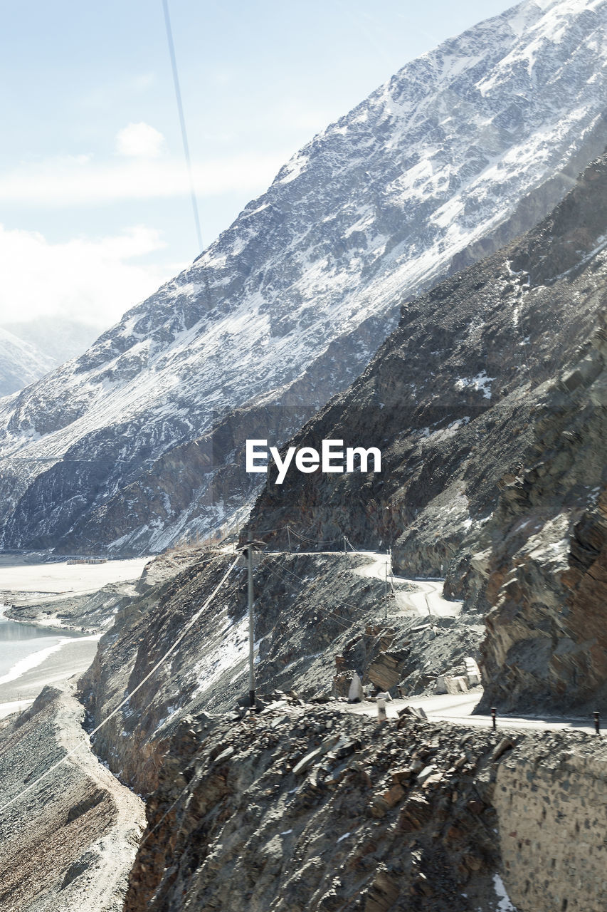 AERIAL VIEW OF SNOWCAPPED MOUNTAINS