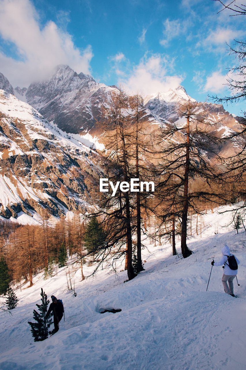 Scenic view of mountains against sky during winter