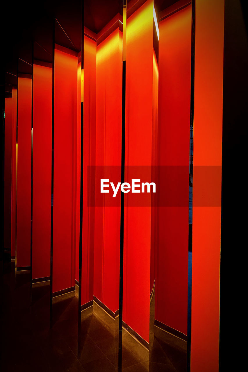 red, light, stage, darkness, indoors, night, architecture, no people, in a row, lighting, interior design, illuminated, entrance, lighting equipment, building, line