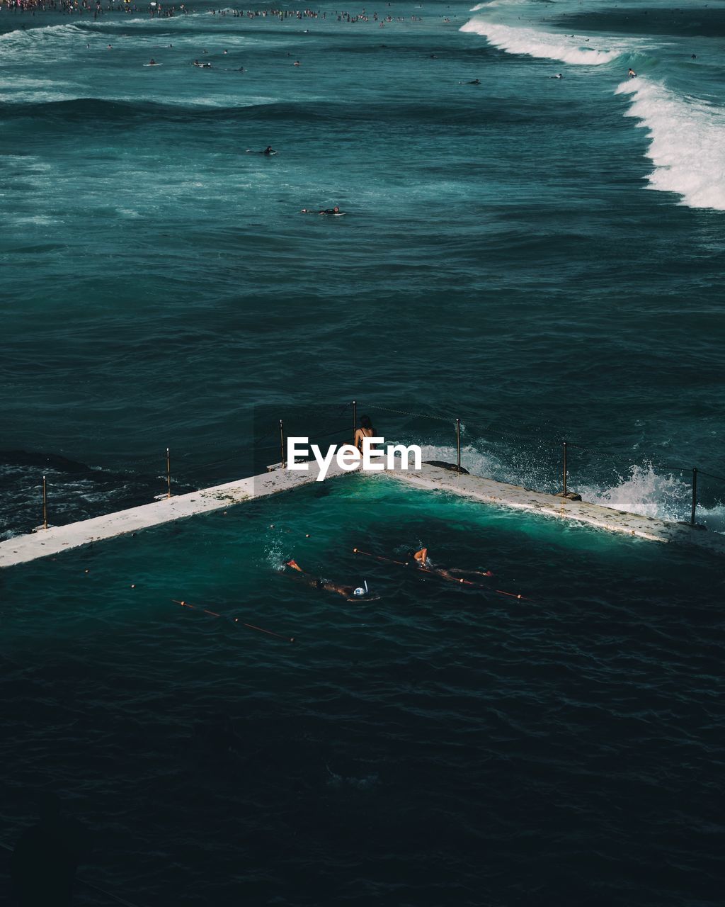 High angle view of infinity pool by sea